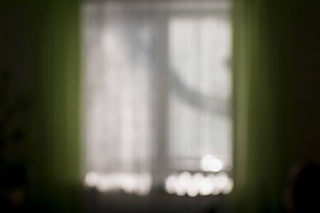 A blurry image of a window inside a room. Street viewの写真素材