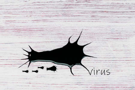 Virus drawn in black paint on a decorative surfaceの写真素材