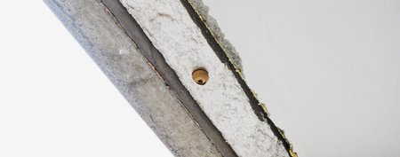 A small hornet's nest in the window opening during repairs, installation of a new window