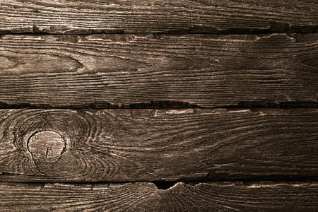 Textural image of decorative painted boards of dark color