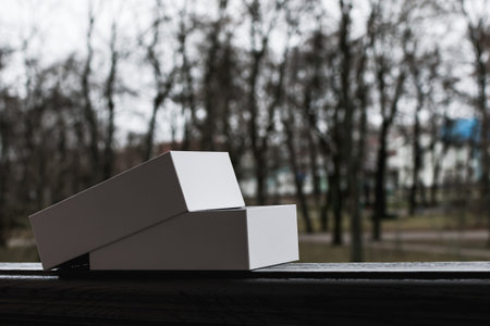 White packing box the small size on the background of the street