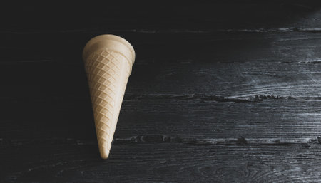 Cake in the form of a cylindrical Cup on a dark decorative backgroundの写真素材