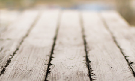 View of the wooden flooring made of old decorative boards from the endの写真素材