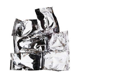 Several small foil shopping bags on a white backgroundの写真素材