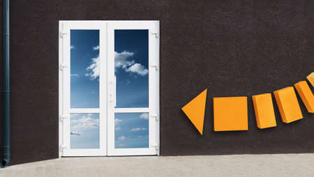 Entrance double-leaf door to the retail space made of white plasticの写真素材