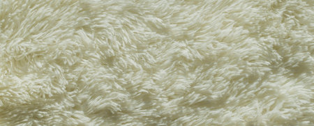 Texture image of the pile of a soft blanket in white color