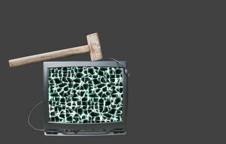 Collage with a big old sledgehammer and old TV setsの写真素材