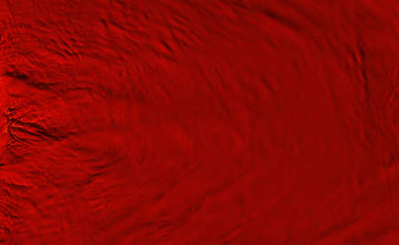 Gurgling and splashing of clear, transparent water on a red backgroundの写真素材