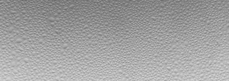 Small raindrops on the car window, on a cold morning