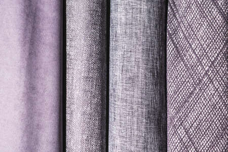 A counter in a store with curtains and tulle in a large assortmentの写真素材