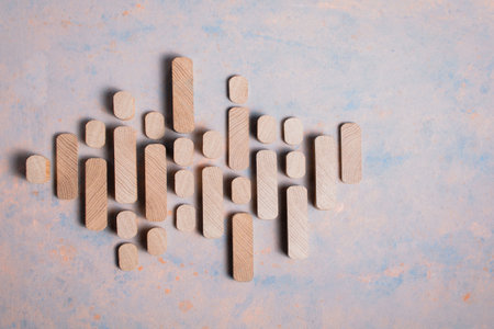 Wooden cubes on a decorative textured surfaceの写真素材