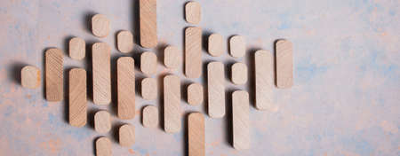 Wooden cubes on a decorative textured surfaceの写真素材