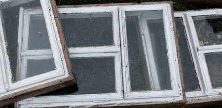 Dismantled old wooden windows in a country houseの写真素材