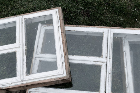 Dismantled old wooden windows in a country house