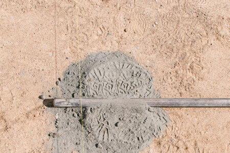 Preparation for laying paving slabs by workers in a private houseの写真素材