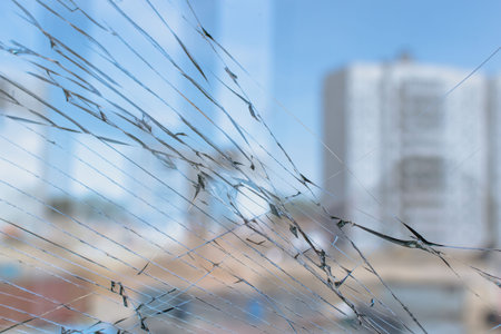 Broken glass of the balcony frame in the new house