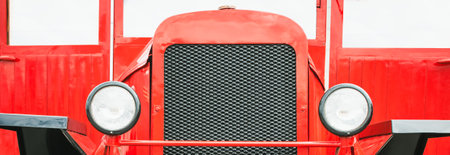 A fragment of an old red fire truck at the exhibitionの写真素材