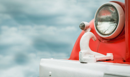 A fragment of an old red fire truck at the exhibitionの写真素材