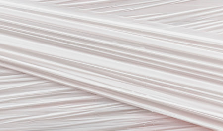 Textural image of a packaging polyethylene film with water dropletsの写真素材