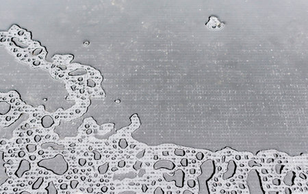 Texture image of wet roofing material made of bitumen roofing materialの写真素材