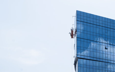 A new office building under construction with a glass facadeの写真素材
