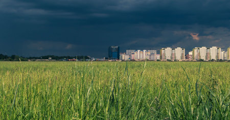 View of the city under construction from the outskirts of the fieldの写真素材