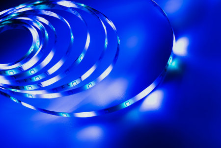 LED strip with multicolored diodes on a dark backgroundの写真素材