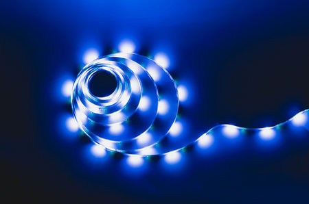LED strip with multicolored diodes on a dark background