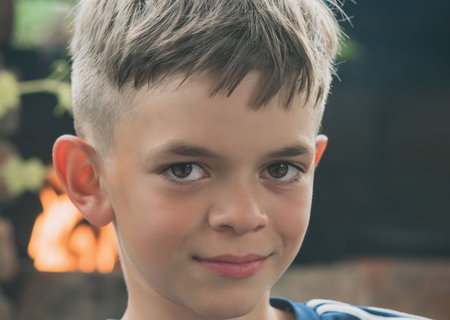 Large portrait of a little boy with brown eyesの写真素材
