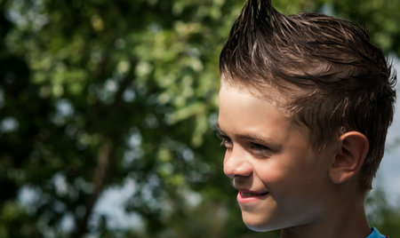 Portrait image of various facial expressions of a little boy with a wet headの写真素材