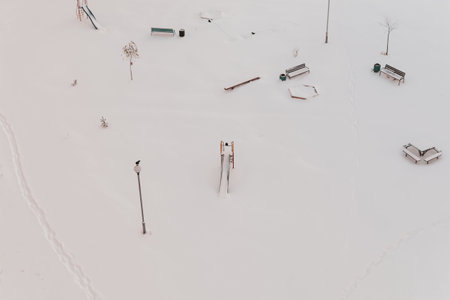 Large children's playground covered with snowの写真素材