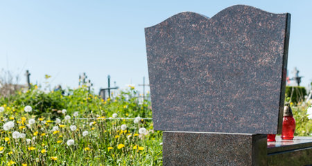 View of a fragment of a tombstone monument in the cemeteryの写真素材