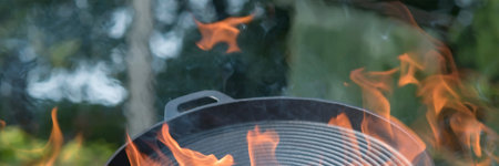 Calcining a new cast iron frying pan over an open fire