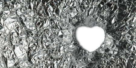 Textured appearance of a thin silver-colored metal foilの写真素材