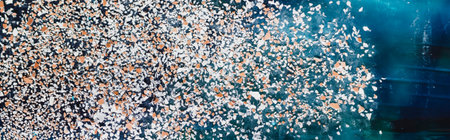 Textured image of a heavily crushed eggshell
