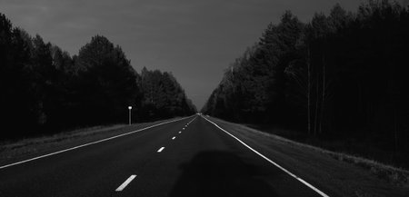 The road while driving in the eveningの写真素材