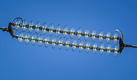 electricity pylon detail isolation steel and glassの写真素材