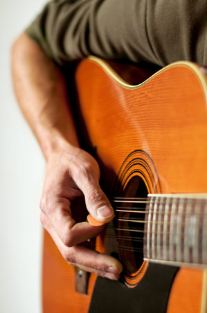 Playing a 12 string acoustic guitar