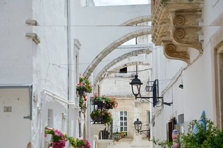 Ostuni white town street view, Brindisi, Apulia (Puglia) southern Italy. Europe.の写真素材