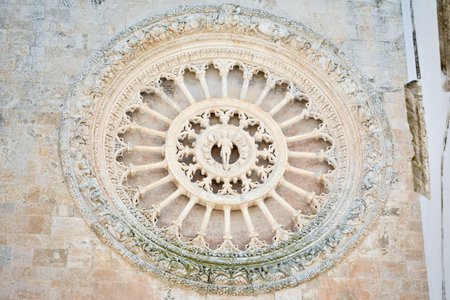 Rose window of the Roman Catholic Cathedral in Ostuni, Puglia, Italy