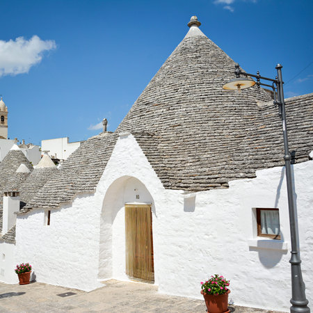 Trulli of Alberobello, Puglia, Italy: Typical houses built with dry stone walls and conical roofs. In a beautiful sunny day.のeditorial素材