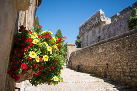 Colorful Flower Bouquet in the beautiful Sermoneta village with medieval houses and the famous Caetani Castle on the top of the hill. Italyのeditorial素材