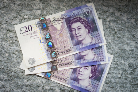 20 British pounds bills on the stone. Finance and business theme.の写真素材