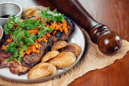 Grilled ribeye beef steak, herbs and spices. Top viewの写真素材
