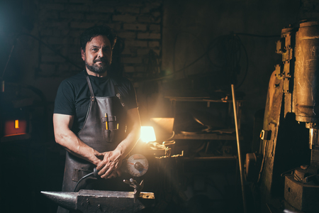 Electric Grinders metal with many sharp sparks, with confined spaceの写真素材