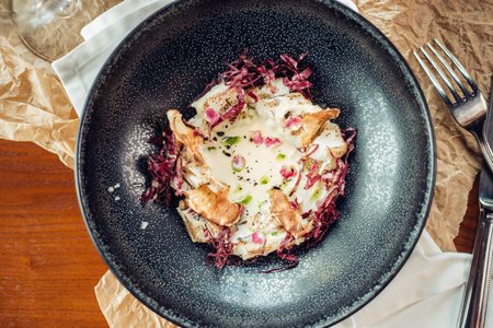 bowl of oatmeal porridge on wood backgroundの写真素材