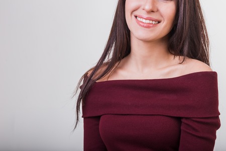 Young beautiful cute girl showing different emotions. Happy, smilingの写真素材