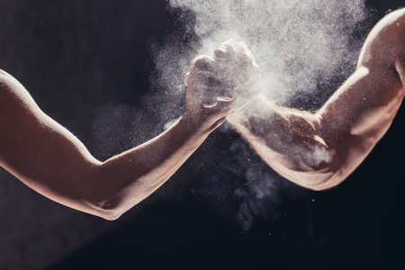 Hands together - fitness team after training - high five. togetherness conceptの写真素材