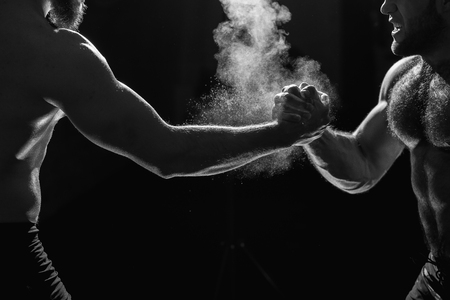 Hands together - fitness team after training - high five. togetherness conceptの写真素材
