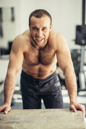 Physically Fit Man posing In A Health Clubの写真素材